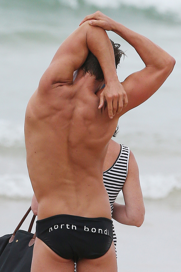 EXCLUSIVE: Angelina Jolie's trainer Luke Hines went for an early morning swim at Bondi Beach