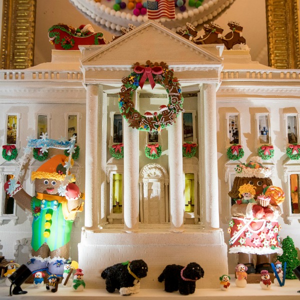 This year's White House Gingerbread House in the State Dining Room of the White House during a preview of the 2015 holiday decor at the White House, Tuesday, Nov. 29, 2016, in Washington. This year's gingerbread house features 150 pounds of gingerbread on the inside, 100 pounds of bread dough on the outside frame, 20 pounds of gum paste, 20 pounds of icing, and 20 pounds of sculpted sugar pieces. (AP Photo/Andrew Harnik)