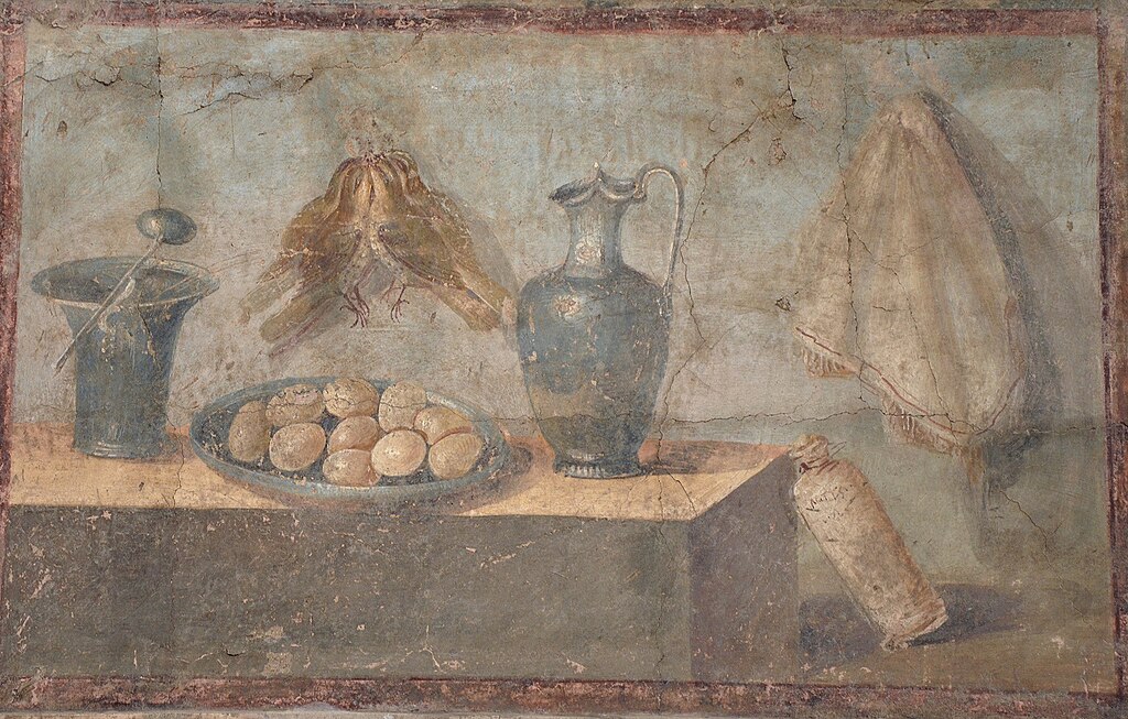 Νεκρή φύση με αυγά-πουλιά και χάλκινα πιάτα