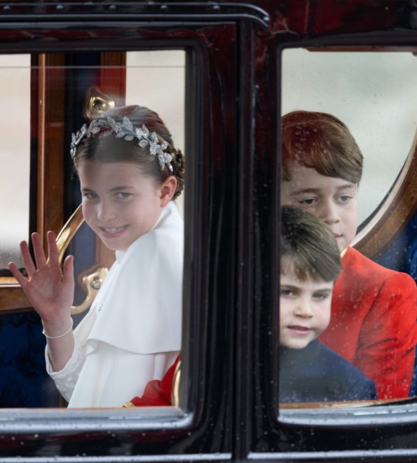 LONDON, ENGLAND - MAY 06: Prince Louis, Prince George and Princess Charlotte travel by carriage during the Coronation of King Charles III and Queen Camilla on May 06, 2023 in London, England. The Coronation of Charles III and his wife, Camilla, as King and Queen of the United Kingdom of Great Britain and Northern Ireland, and the other Commonwealth realms takes place at Westminster Abbey today. Charles acceded to the throne on 8 September 2022, upon the death of his mother, Elizabeth II. (Photo by Samir Hussein/WireImage)