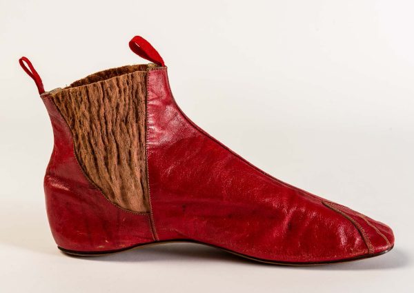 Red leather boots with elasticated sides 1840s. © Fashion Museum Bath
