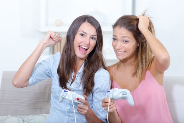 sisters playing video games