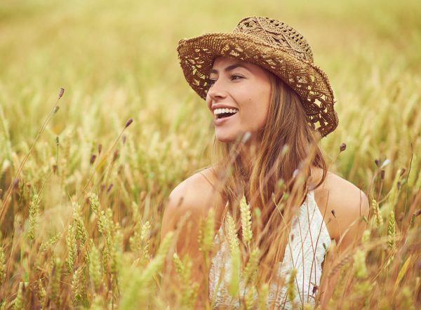 Cropped shot of a young woman in a wheat field.
