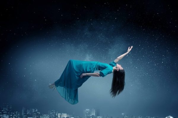 Woman levitating in sky . Mixed media